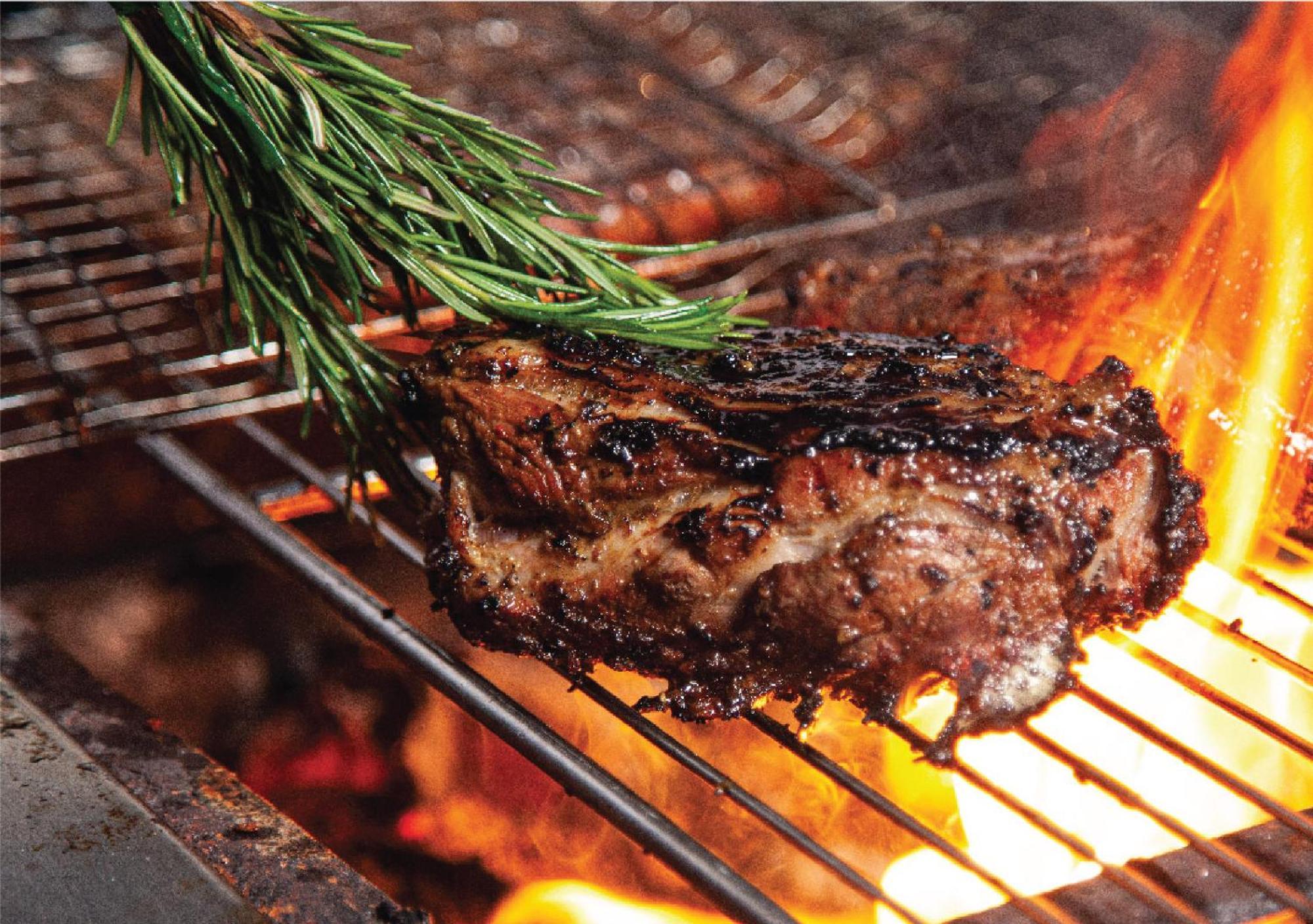 Jumeirah Messilah Beach Kuwait Кувейт Экстерьер фото A steak being grilled